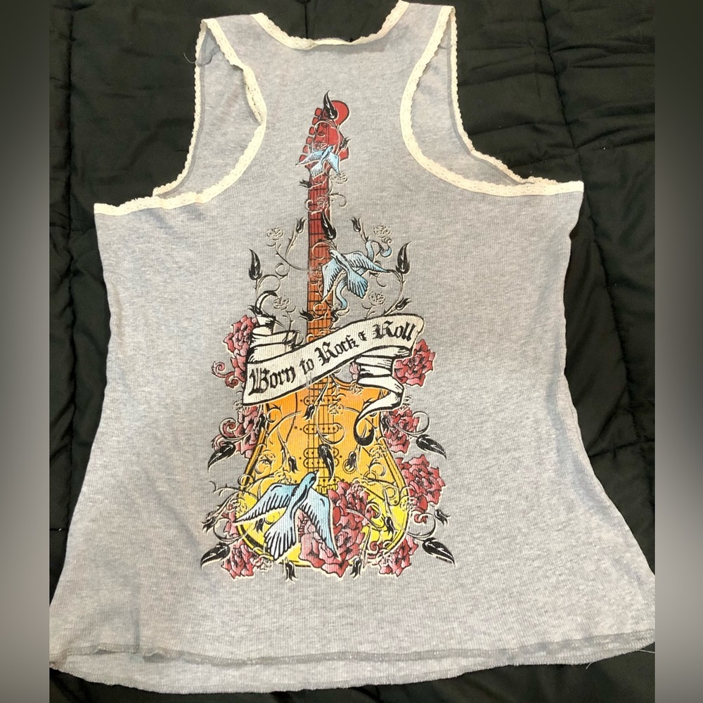 Torrid GUITAR with sparrows and rock n roll graphics on back of tank.